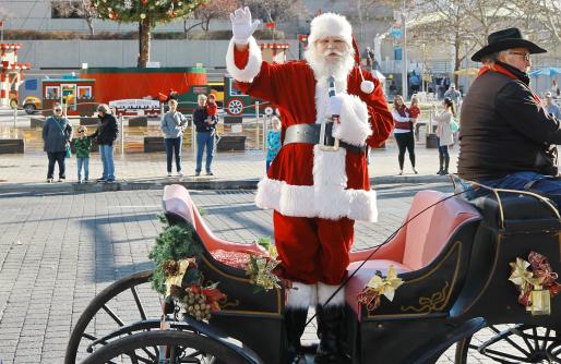 Santa standing in the carriage