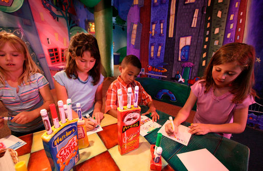 children creating a puzzle at Kaleidoscope