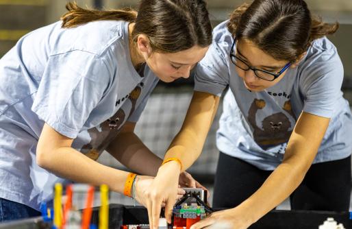Two Students working on robotics