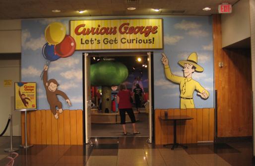 Curious George Showplace Entrance George Hanging on Balloons