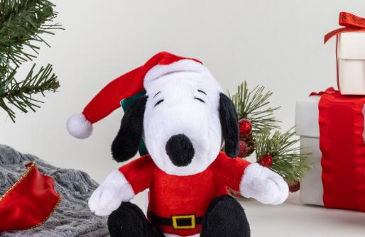 Snoopy in Santa Suit by Tree