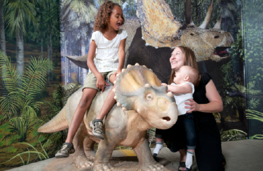 mom/kids and dinosaur