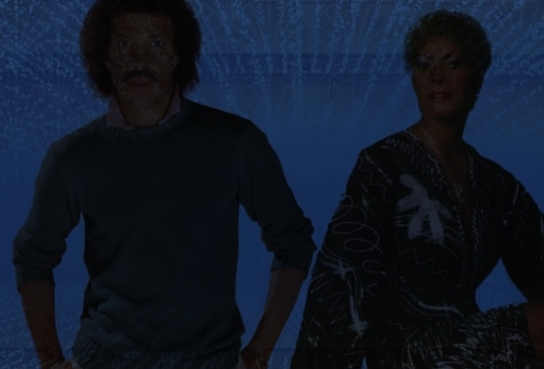 Outline of Two men standing against dark blue background 