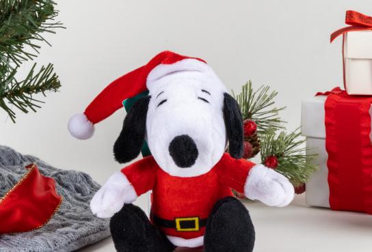 Snoopy in Santa Suit by Tree