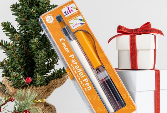 White Pilot Parallel Calligraphy Pen in packaging by Christmas tree