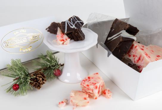 Fudge slices on cake stand and in box